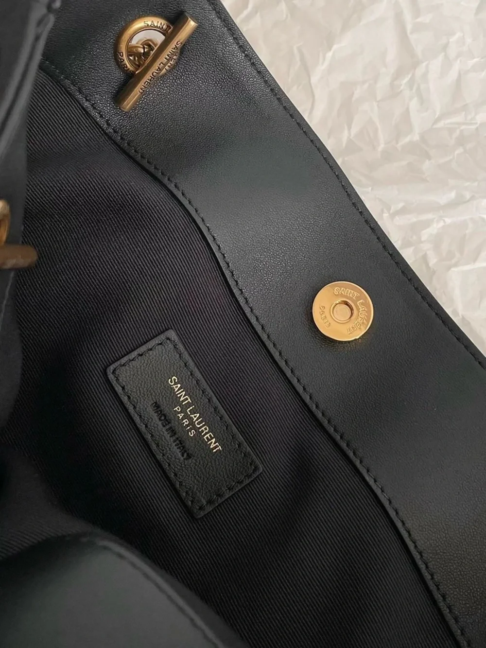 Saint Laurent Black Leather Shoulder Drawstring Bag with Gold Chain
